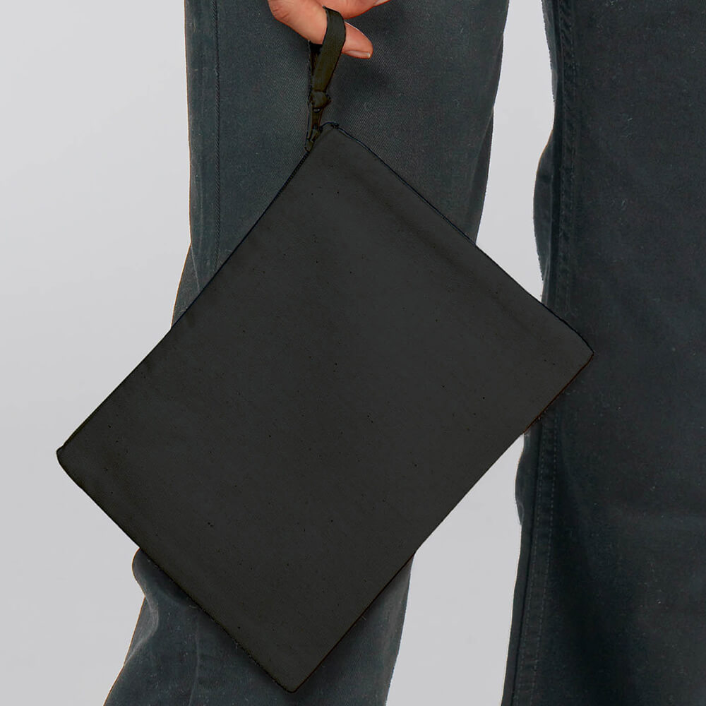 Image of someone holding a Stanley Stella Embroidered Grab Bag in black